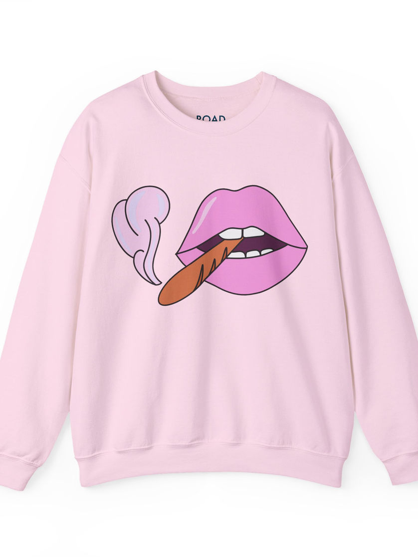 Pink sweatshirt with cartoon lips and a cigarette smoking graphic design.