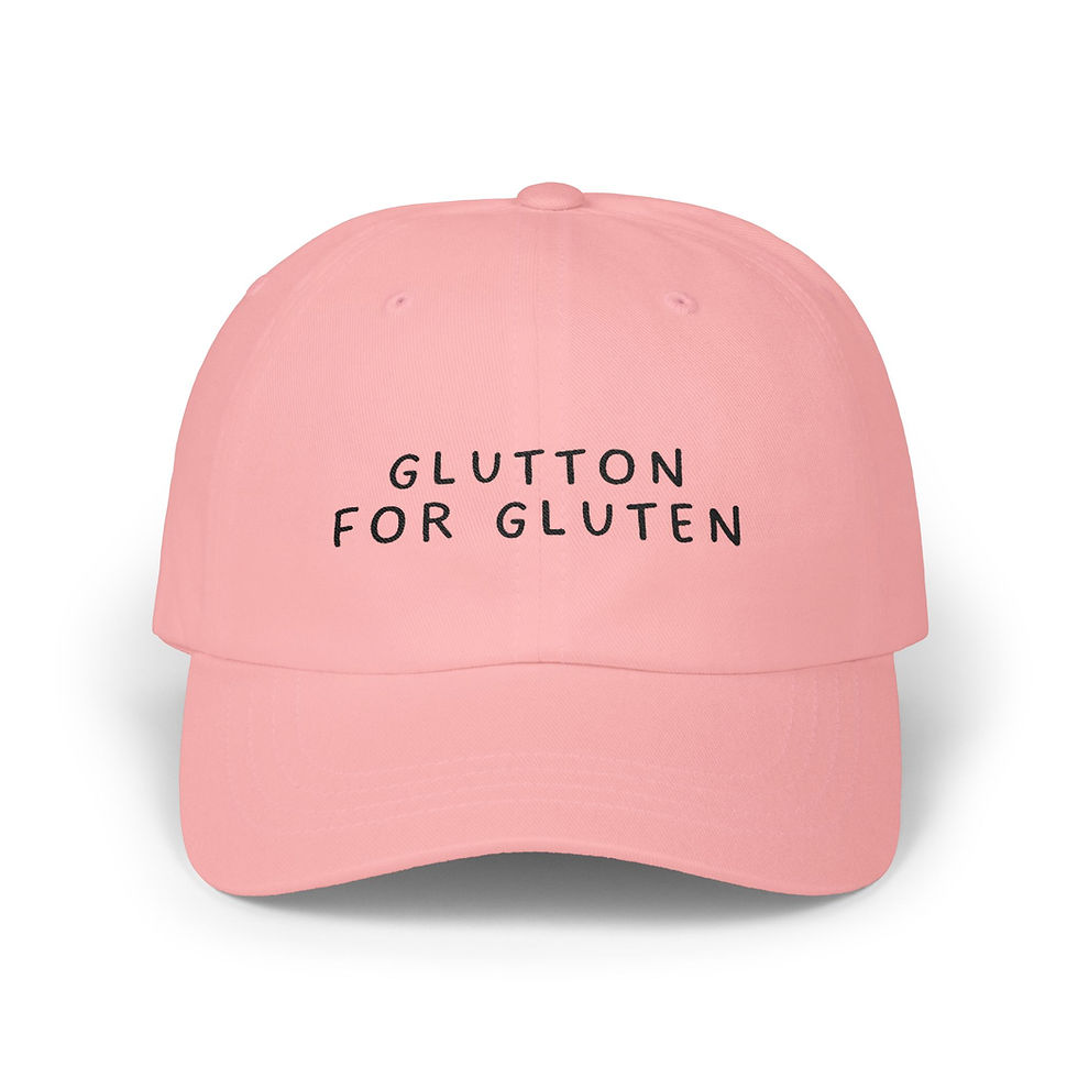 Pink baseball cap with 'GLUTTON FOR GLUTEN'