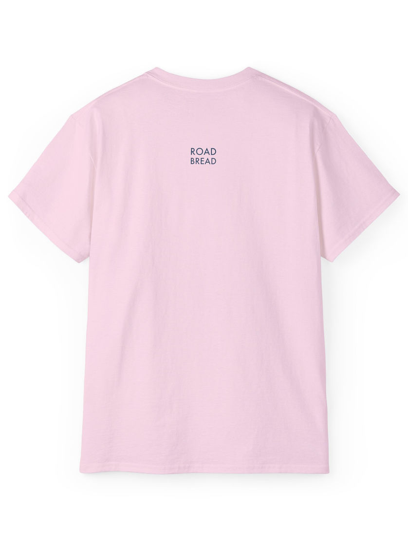Pastel-pink T-shirt, back view, tiny white ROAD BREAD word-mark just below the necklin