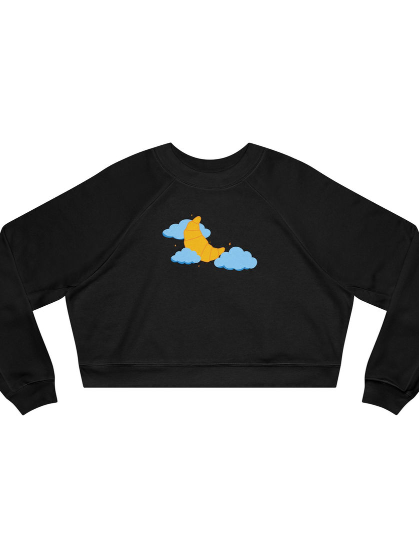 Black cropped crewneck sweatshirt featuring a crescent-shaped croissant nestled between cartoon-style clouds on the front.