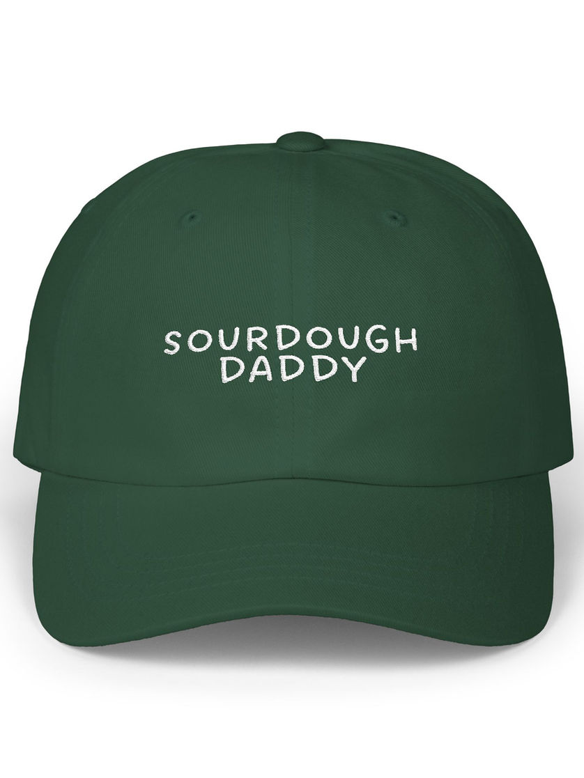 Green baseball cap with 'SOURDOUGH DADDY' text