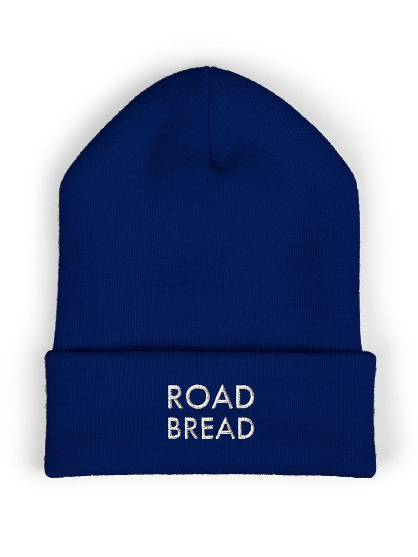 Royal-blue beanie, white “ROAD BREAD” embroidery on cuff