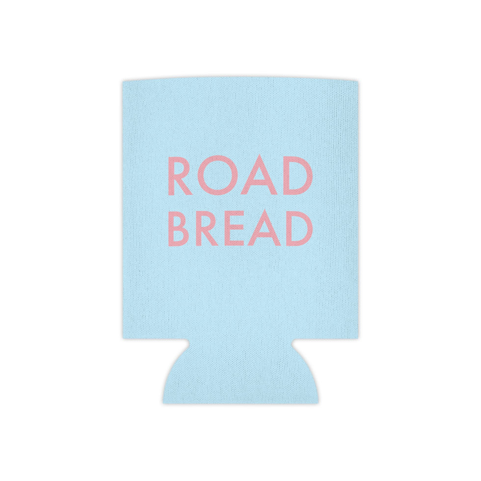 Back view of the same koozie on a can with pink “ROAD BREAD” lettering centered
