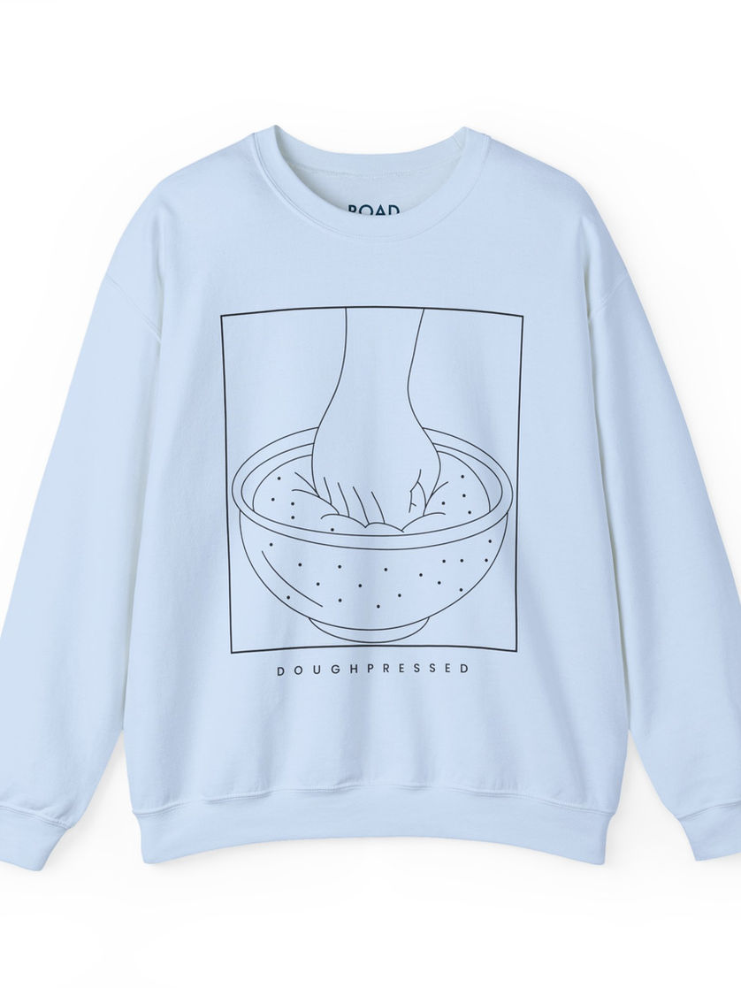 Light blue sweatshirt with graphic of hand in a bowl,