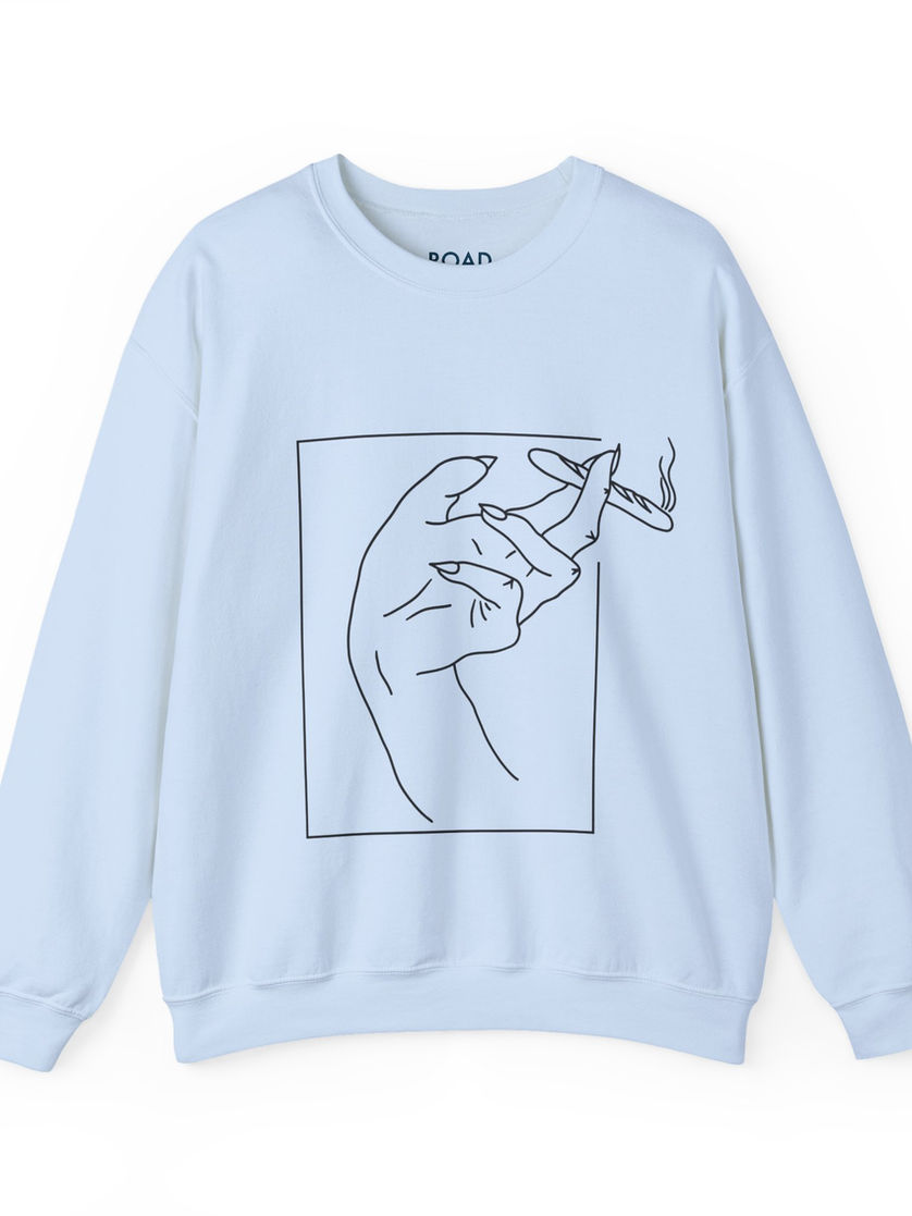 Light blue sweatshirt featuring a hand with a cigarette, within a square.