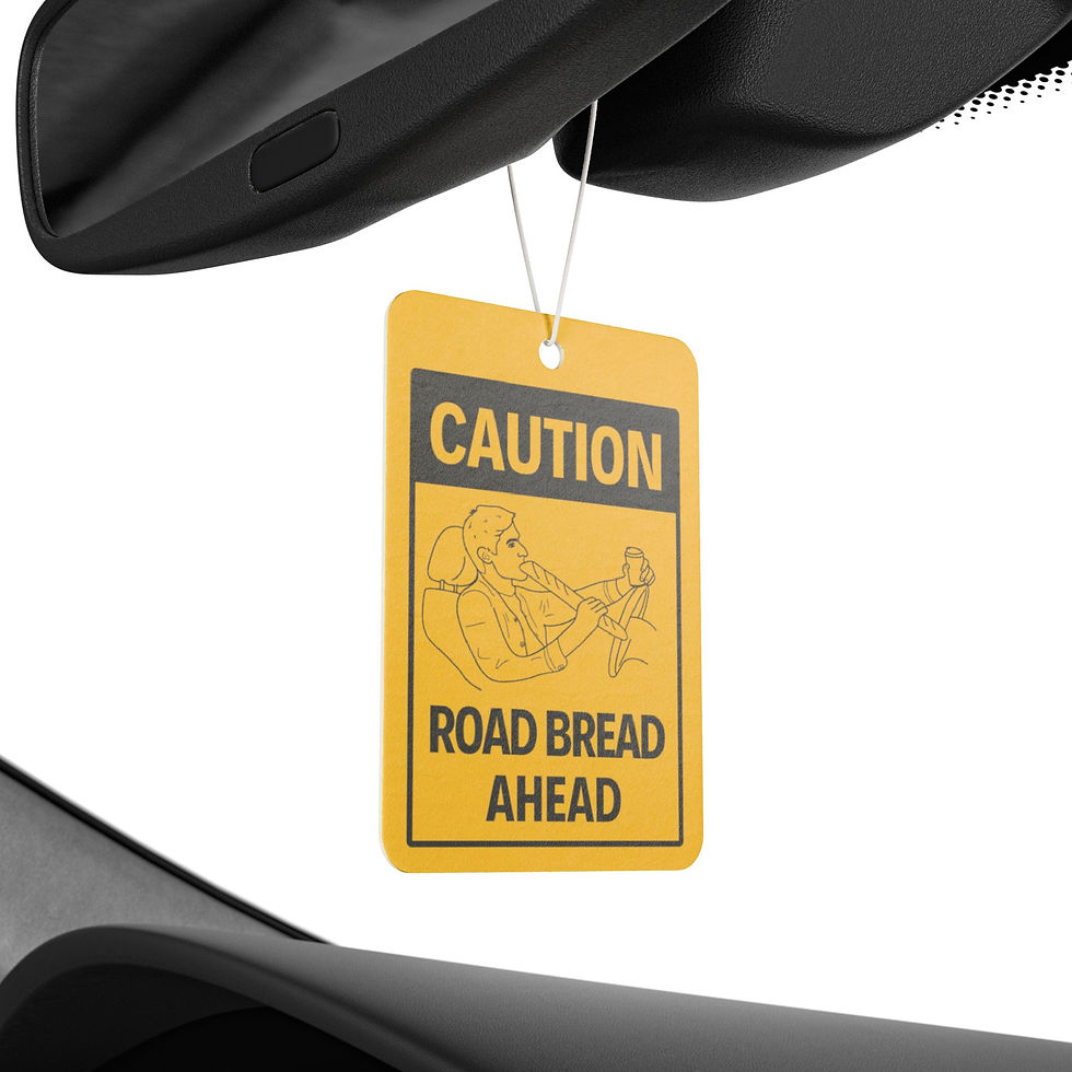 In-car: Air freshener hanging from a car’s rear-view mirror above the dashboard.