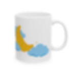 White ceramic coffee mug featuring a crescent croissant design resting between soft blue clouds with small star accents.