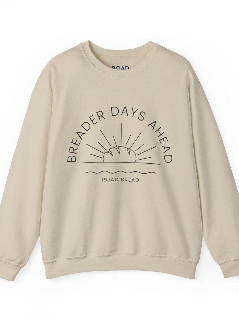 Cream crewneck sweatshirt with "Breader Days Ahead" design and Breader Days Ahead Crewneck.