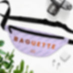 A Fanny Pack with the word baguette written in bold orange letters. The pack is light purple and has small baguettes on it.