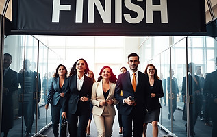 A group of women and men professionals in suits walking toward the finish line.jpg