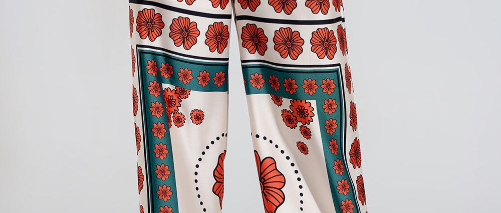 Satin Creme Flared Pants With Floral Design