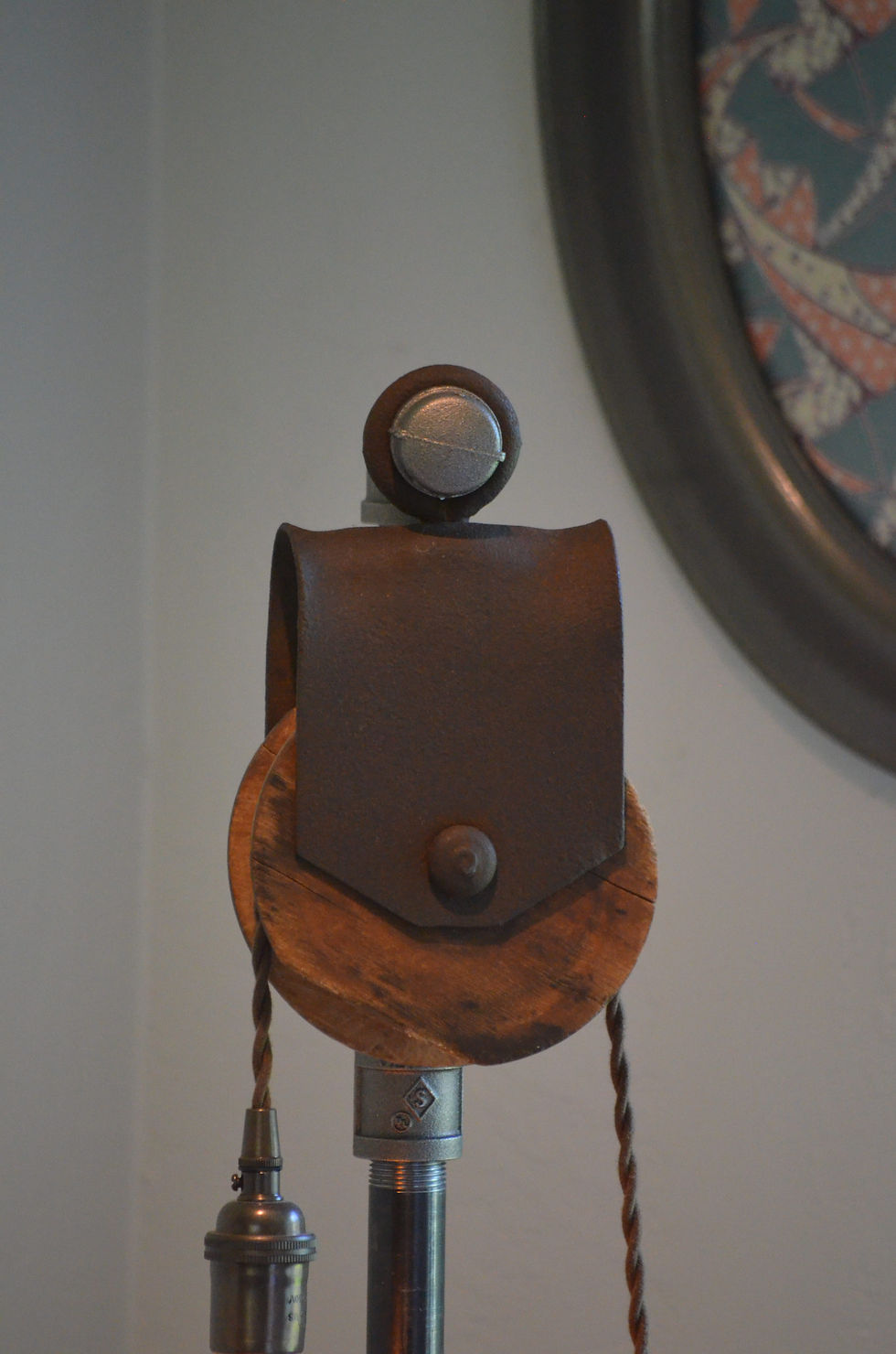 Thumbnail: Close up of wood and metal vintage barn pulley