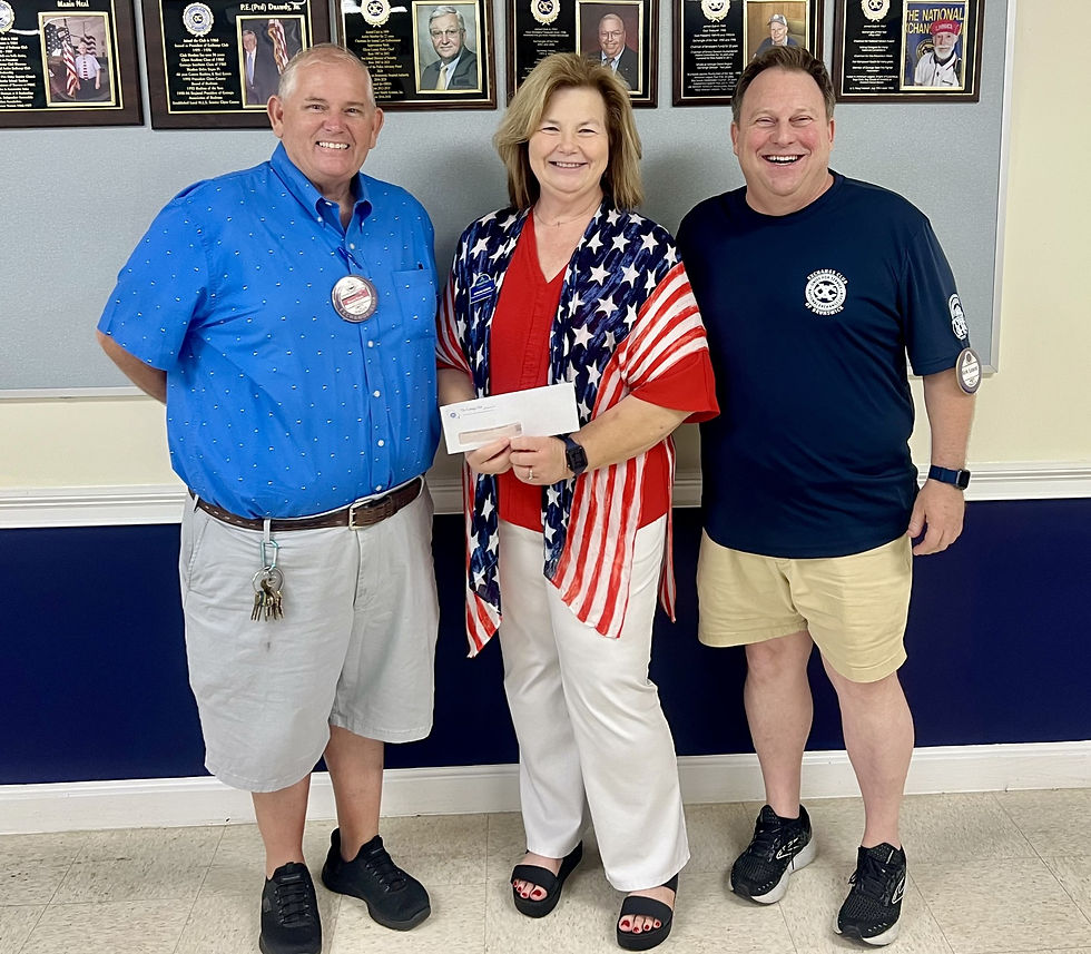 Pictured from left to right Pres. Steven Floyd, Stephanie Roberts and Vice Pres Kirk Loard.