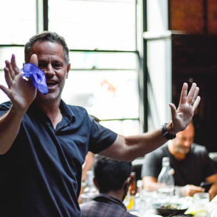 Bloke making hanky appear.jpg