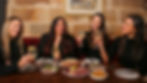 group-girlfriends-are-sitting-restaurant-they-all-take-pictures-their-smartphones_935552-6