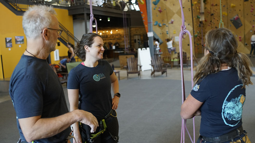 3climberssmiling indoors