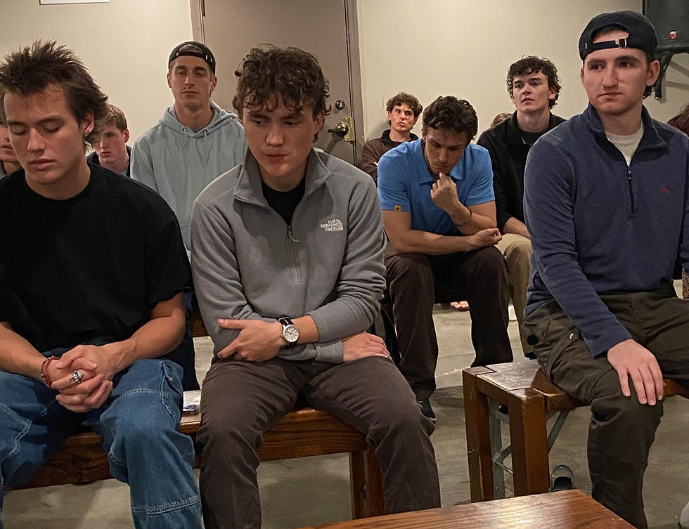 Attentive Alpha Delts during the readings (with Tom Russ at far right, front).
