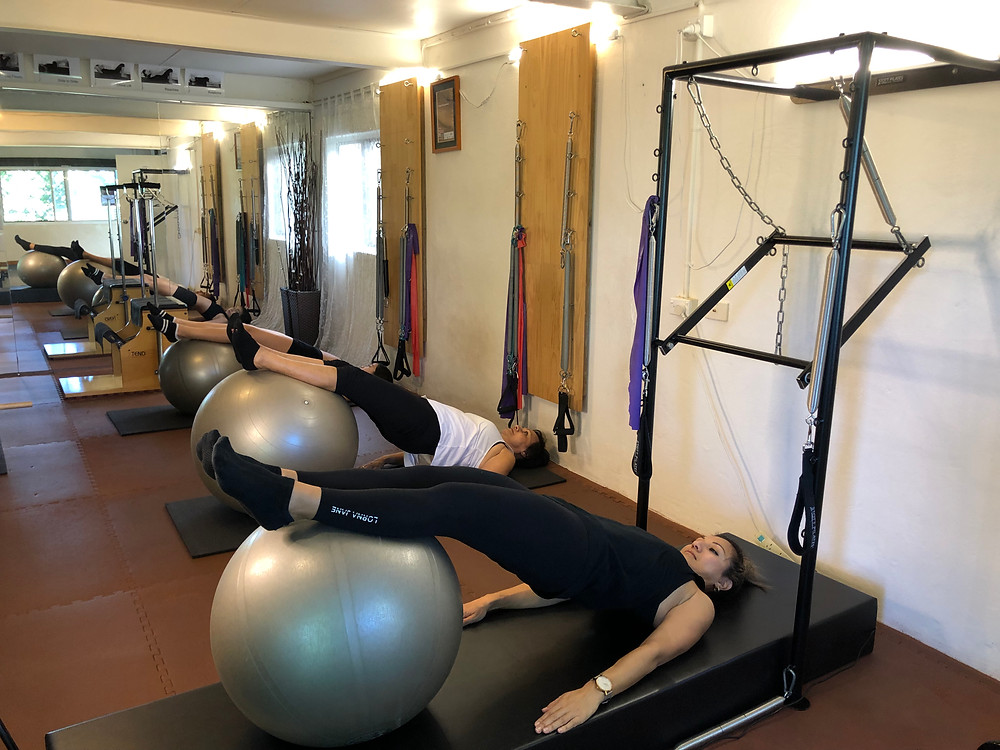 3 generation mum and daughters Physio Pilates studio class ball exercises