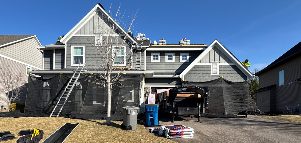 Roof Replacement with Catch All System in use 