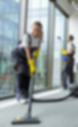 high-angle-view-of-smiling-cleaner-vacuuming-floor-2024-11-14-13-49-06-utc-min-1000x1300.j
