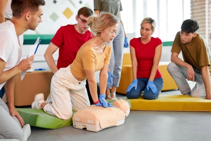 College girl in a CPR training certification class