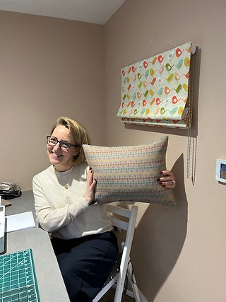 beginner's studenthappy and  holding cushion shes has ade