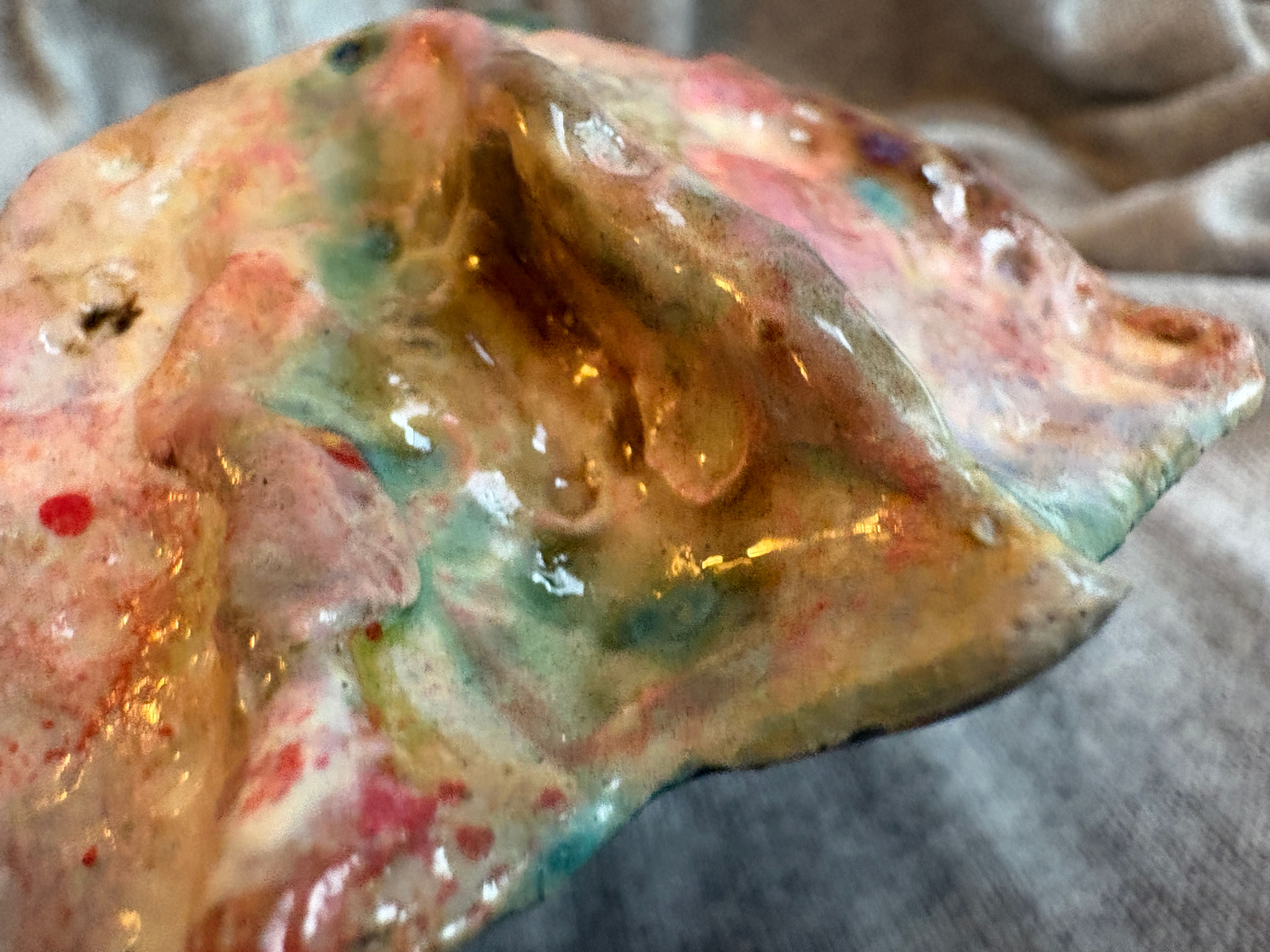 Close-up of the Porcelain Wave Bowl's colorful glazed texture
