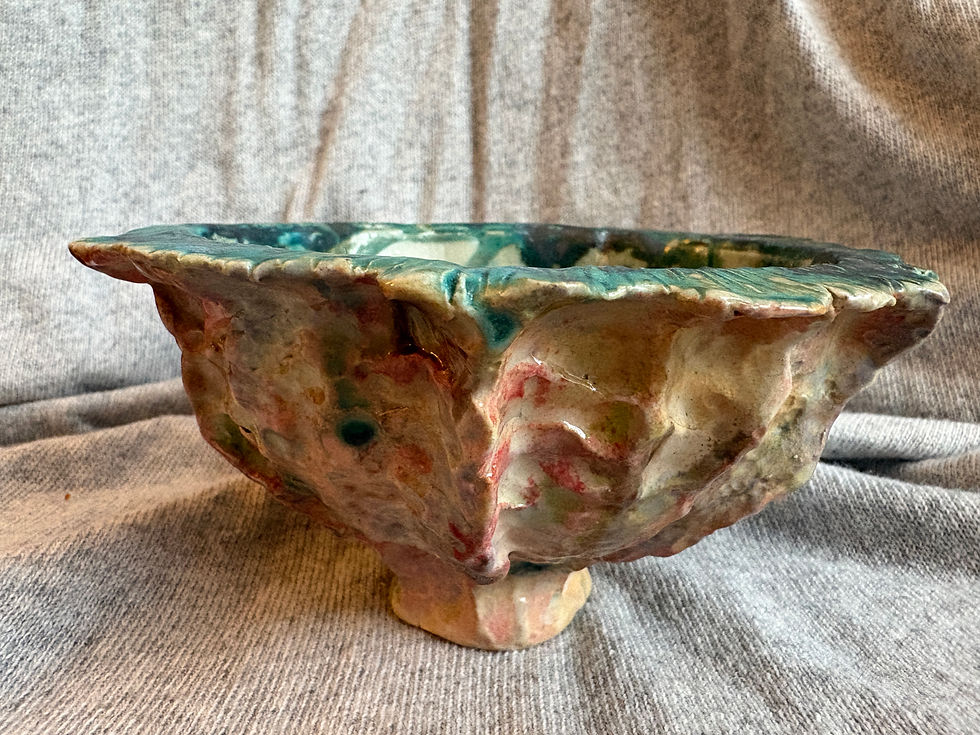 Thumbnail: Handmade porcelain wave bowl with textured glaze.