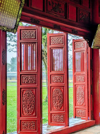 Red wooden doors at Hue Citadel