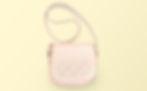 a small, pink change purse with a yellow background