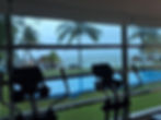 Gimnasio con vista a la alberca