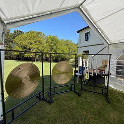 Gong setup under a marquee at an outdoor staff wellbeing day, held at a care home