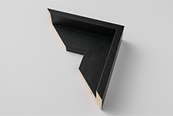 Photograph of a frame in black painted grain