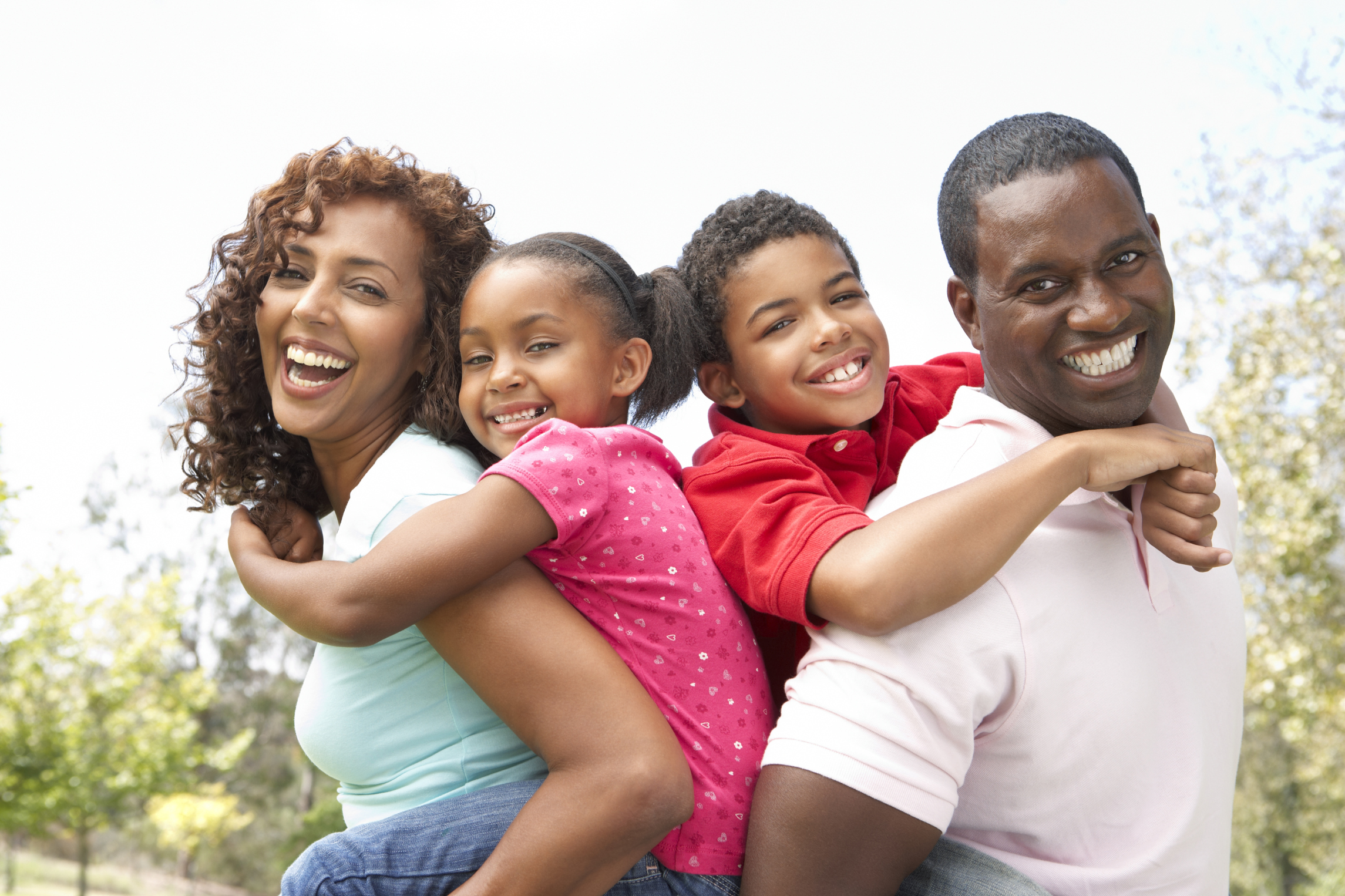 Family smiling at camera 