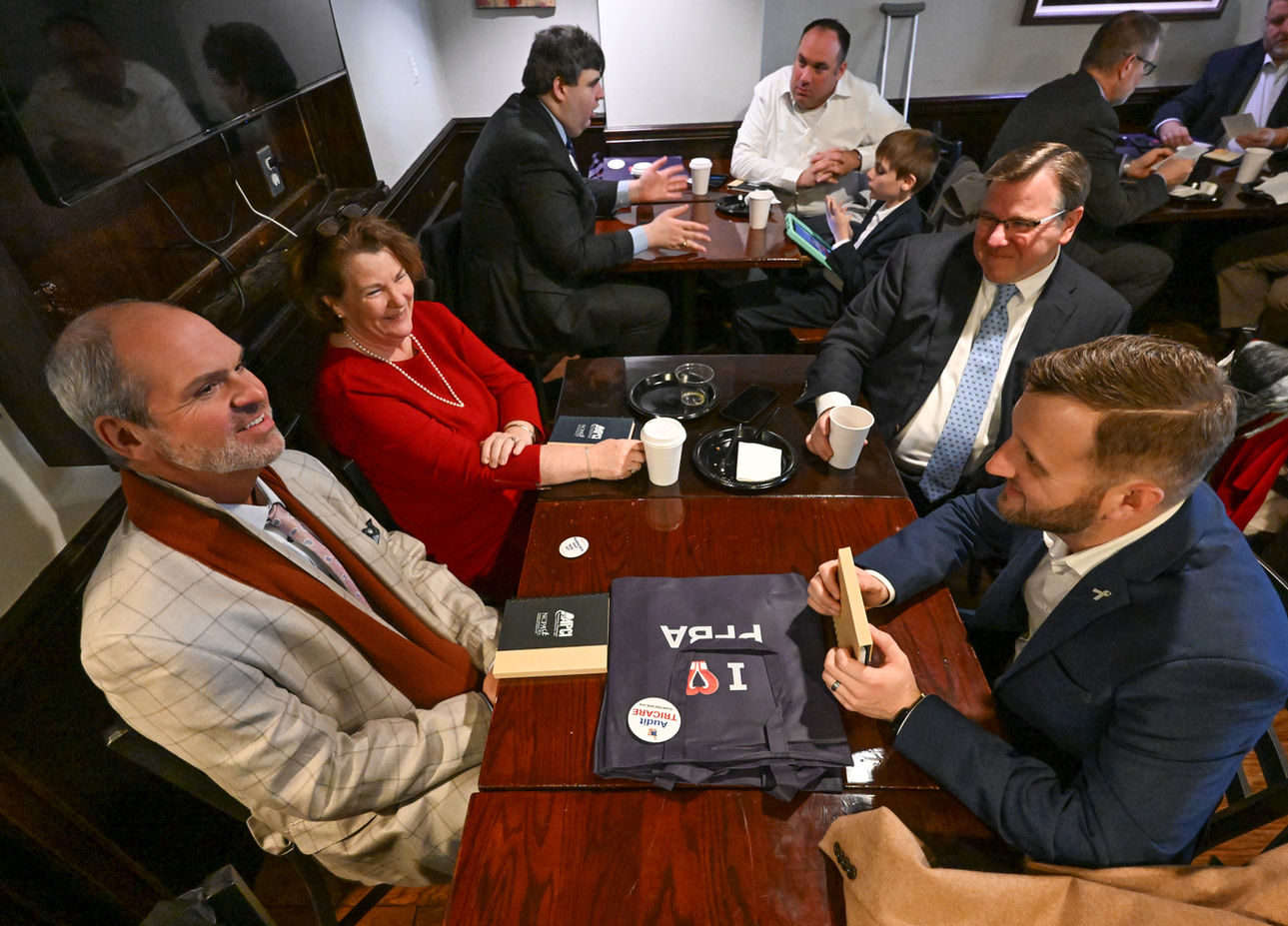 People sitting around a table in Washington DC for PFBA