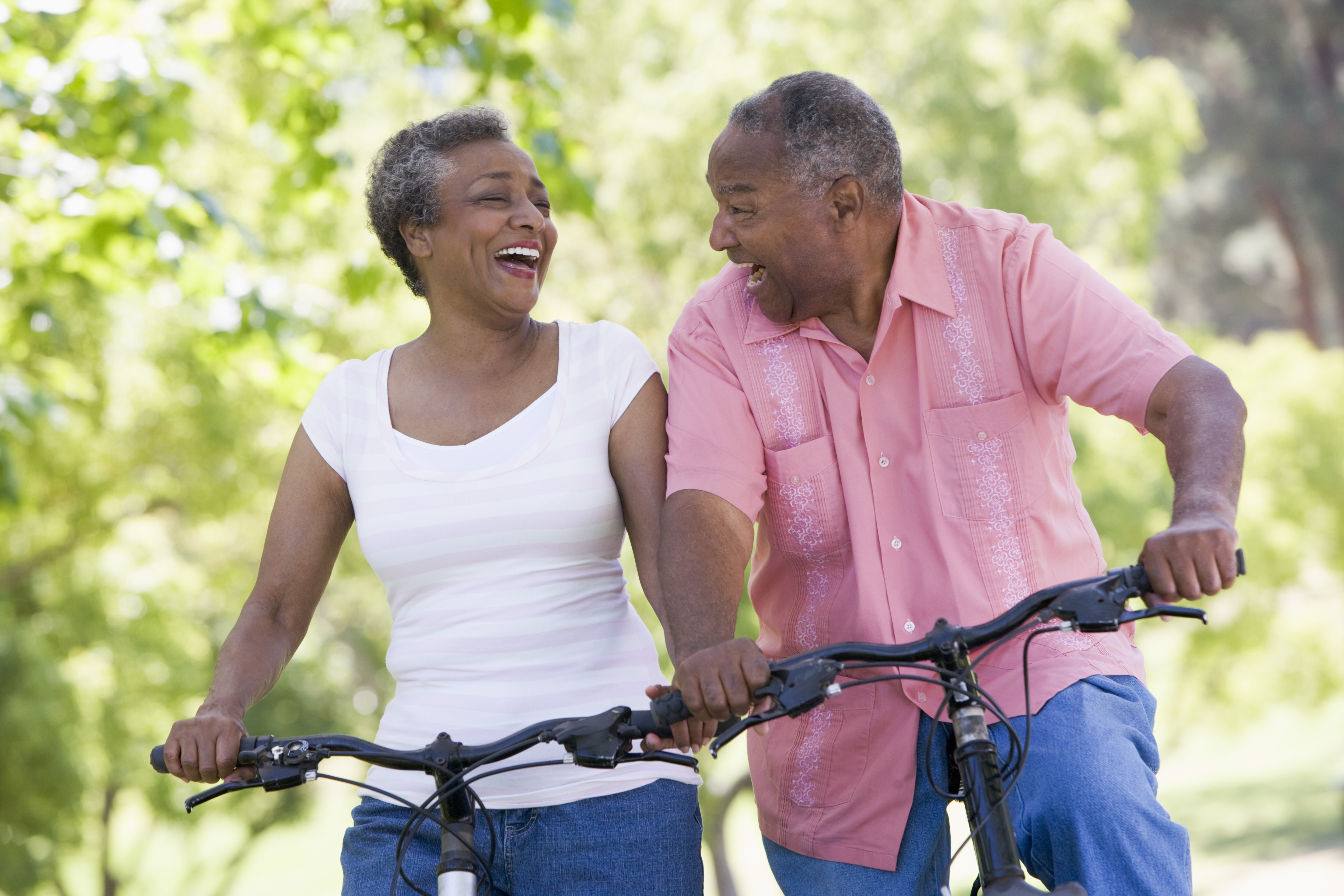 older couple riding bicycles