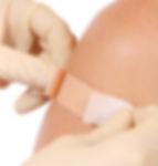 Bandaid on arm