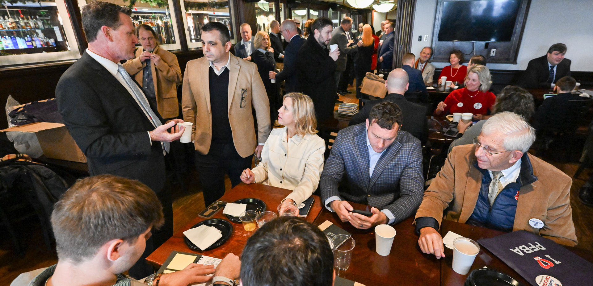 People sitting around a table in Washington DC for PFBA