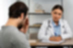 man talking to doctor about mental health