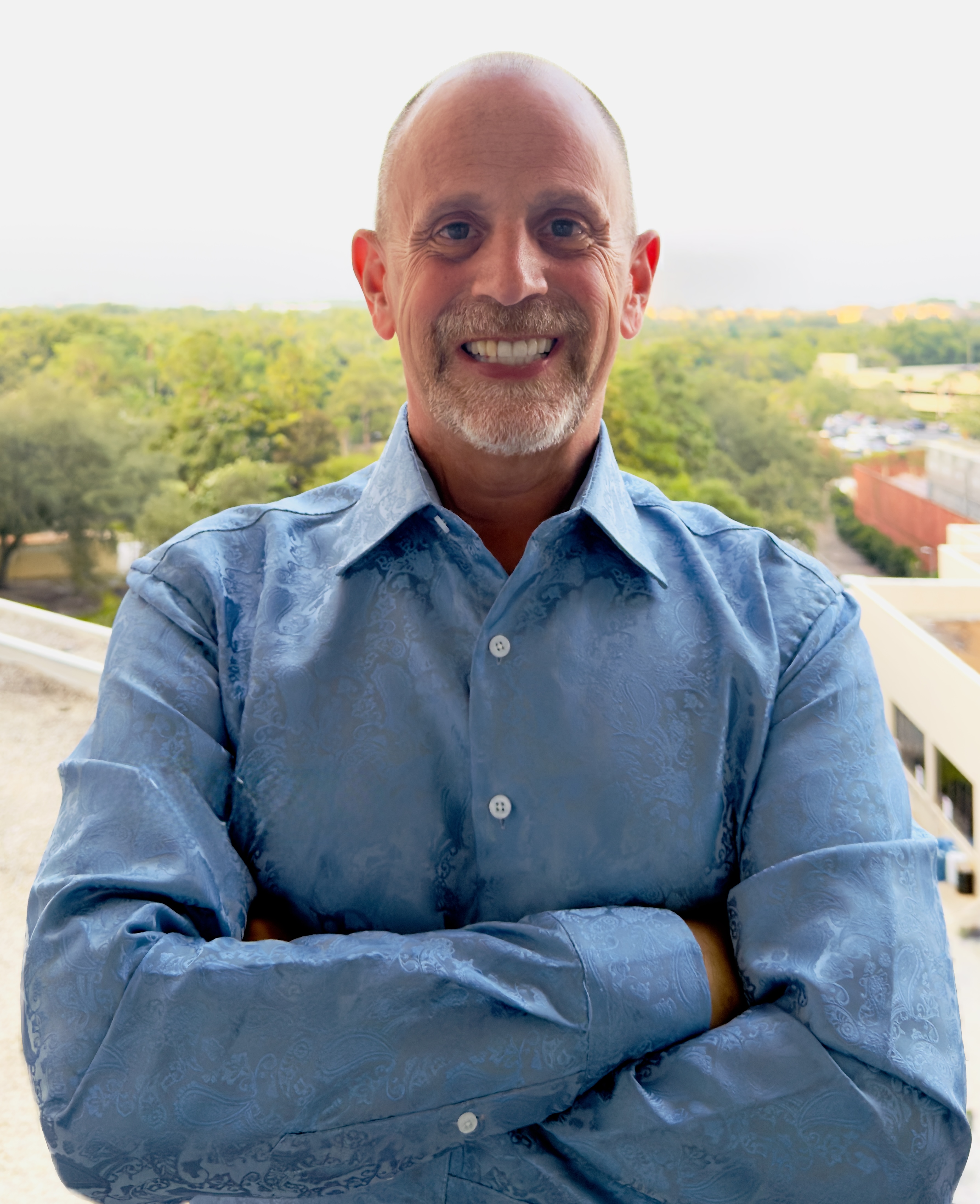 Jay Phipps standing arms crossed