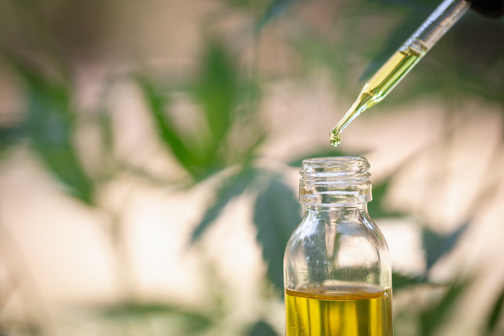 CBD oil bottle with dropper