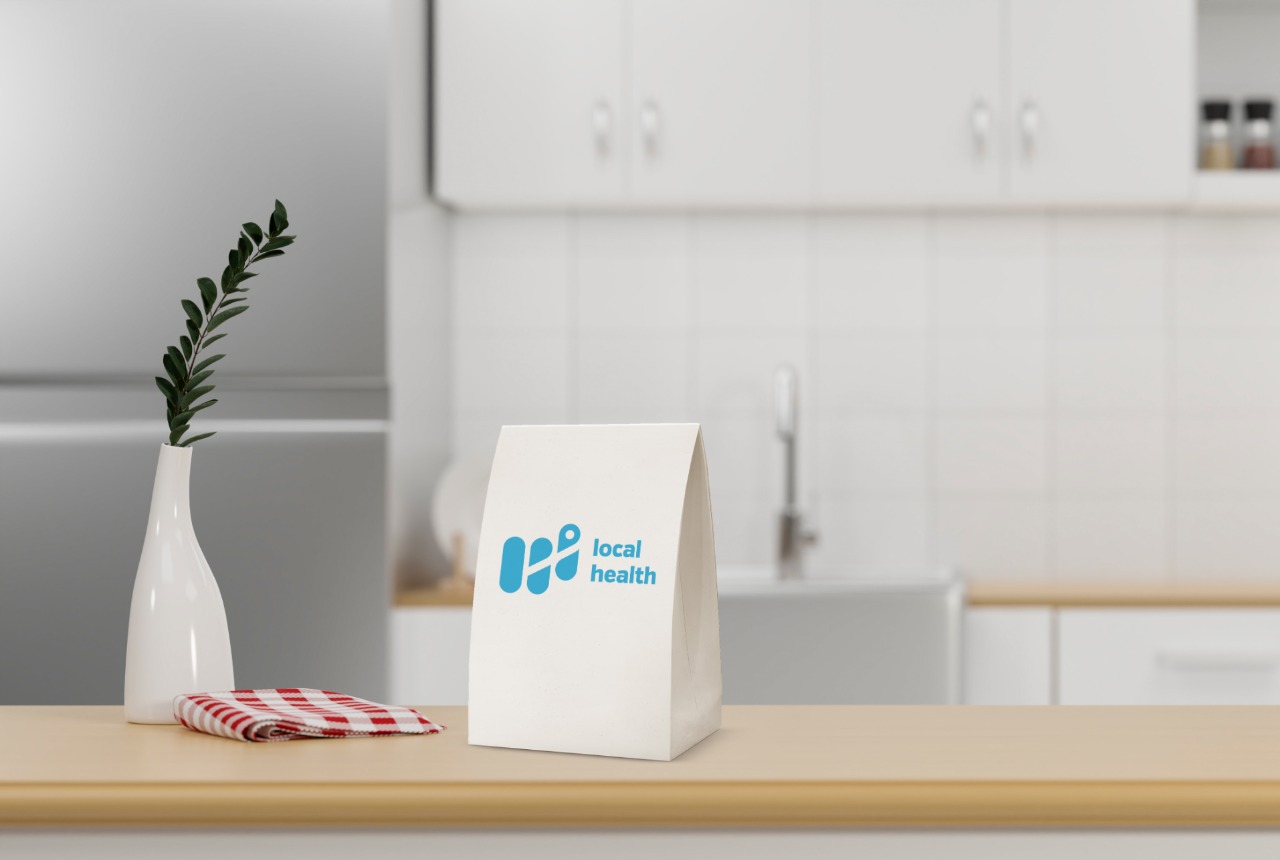 local health prescription delivery bag on kitchen counter
