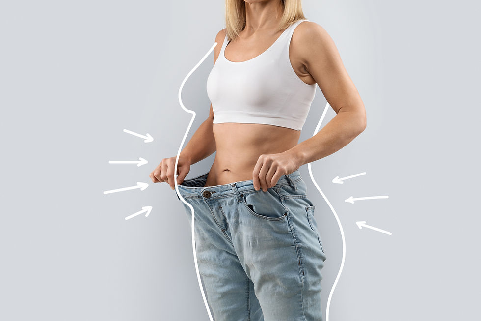 woman_large jeans_smiling_weight loss_cropped.jpg