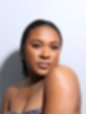 Portrait of a young woman with dark brown skin