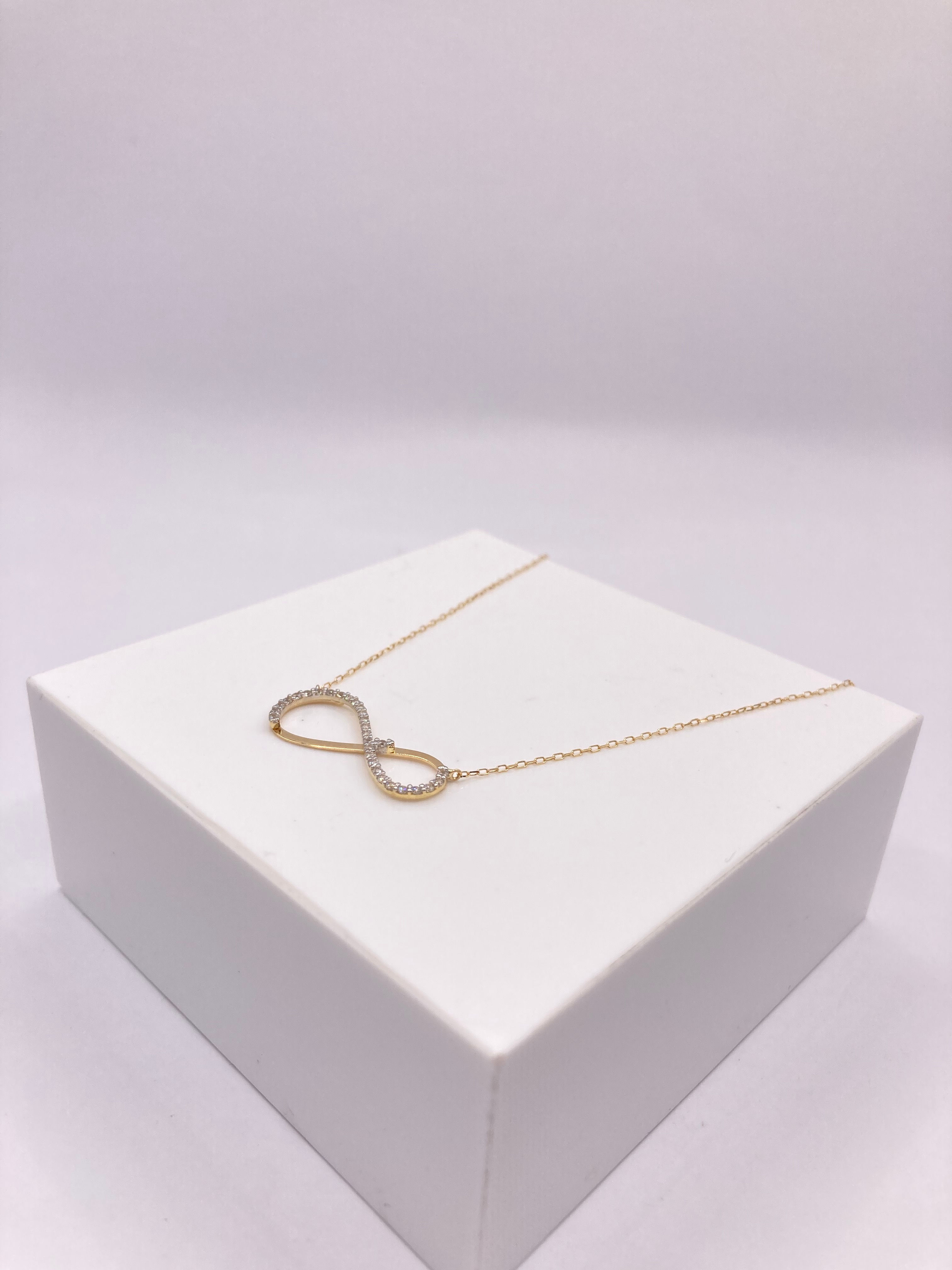 COLGANTE INFINITO ORO