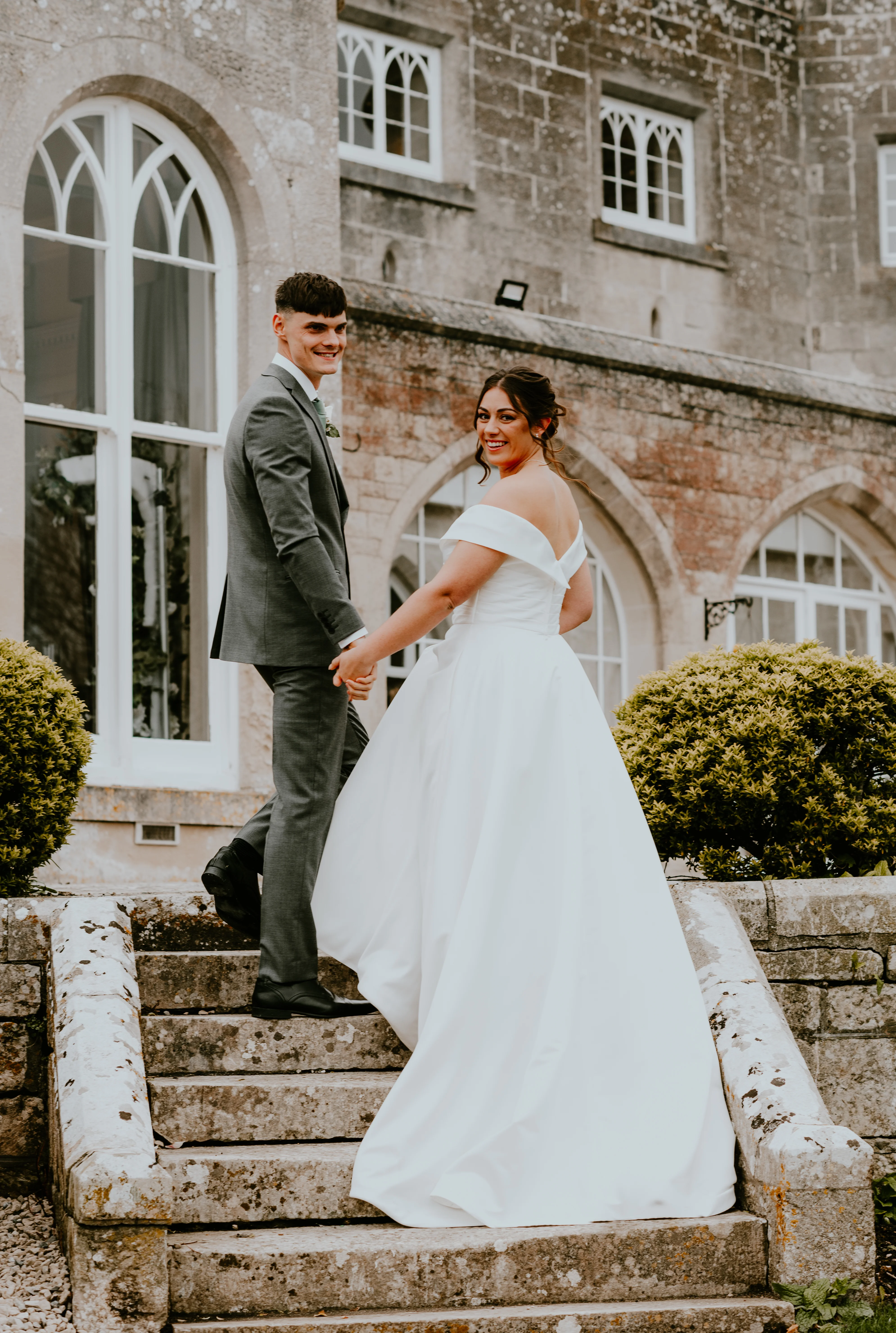 Couple portraits outside castle