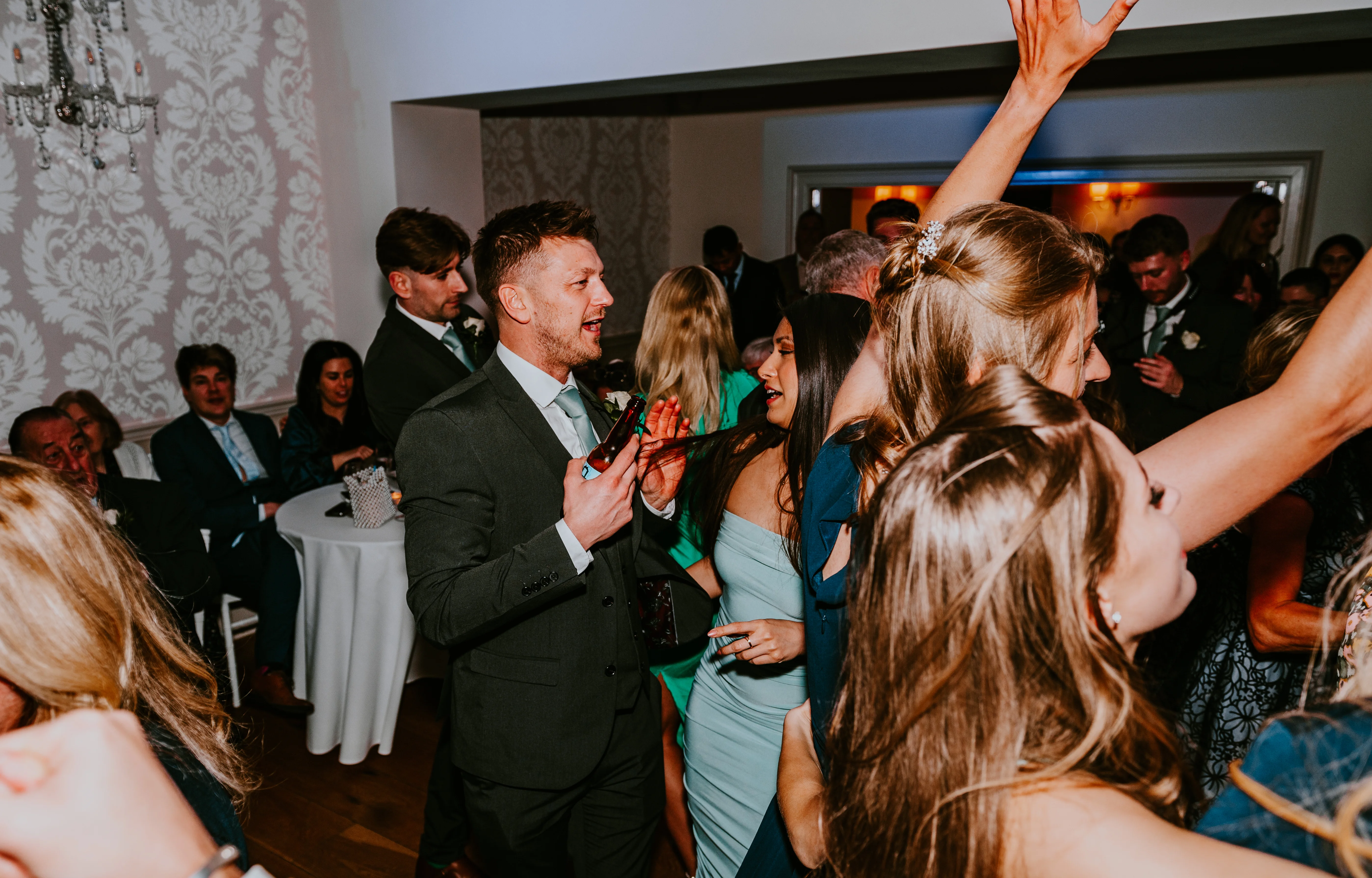 wedding party guests dancing