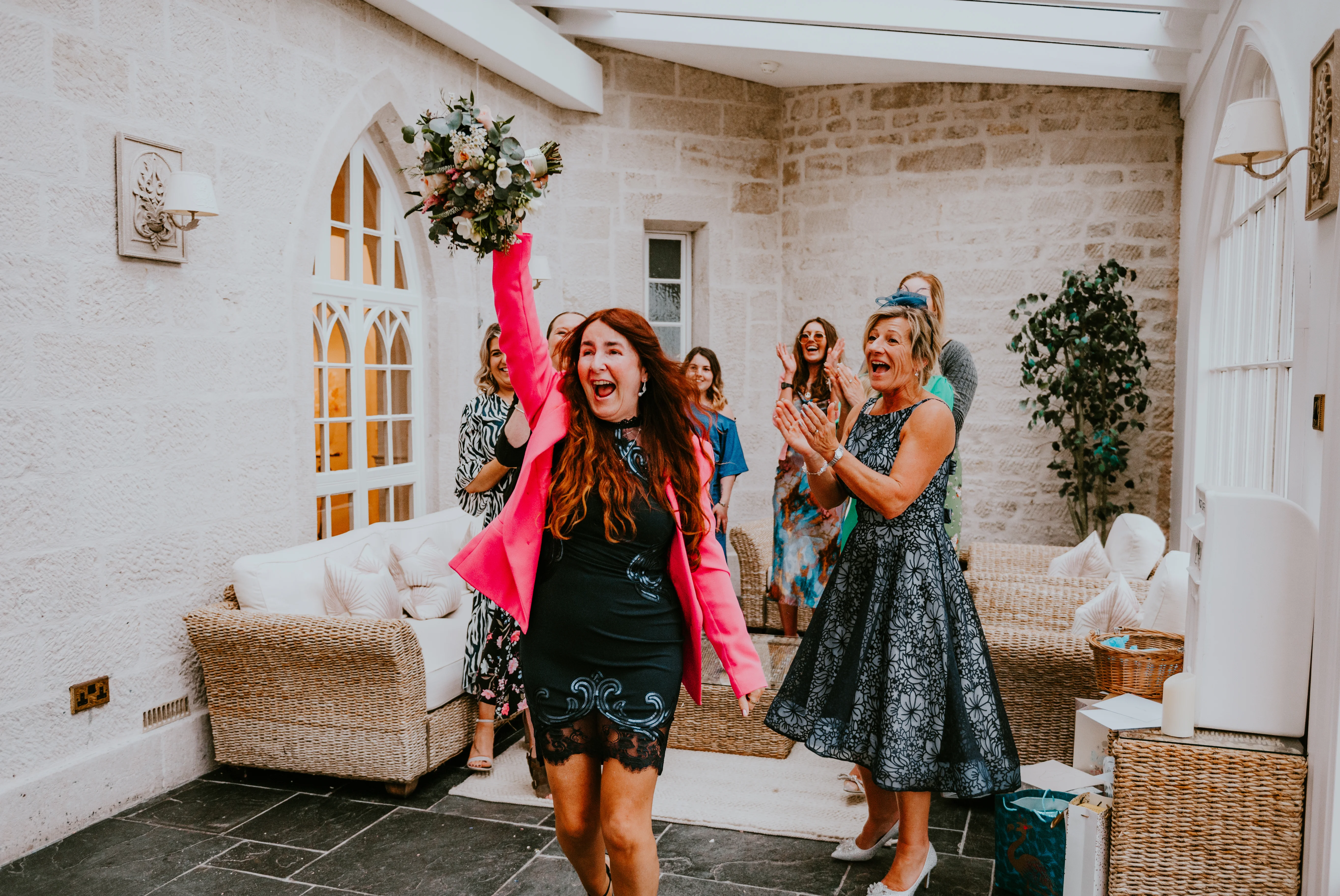 bouquet toss wedding reception