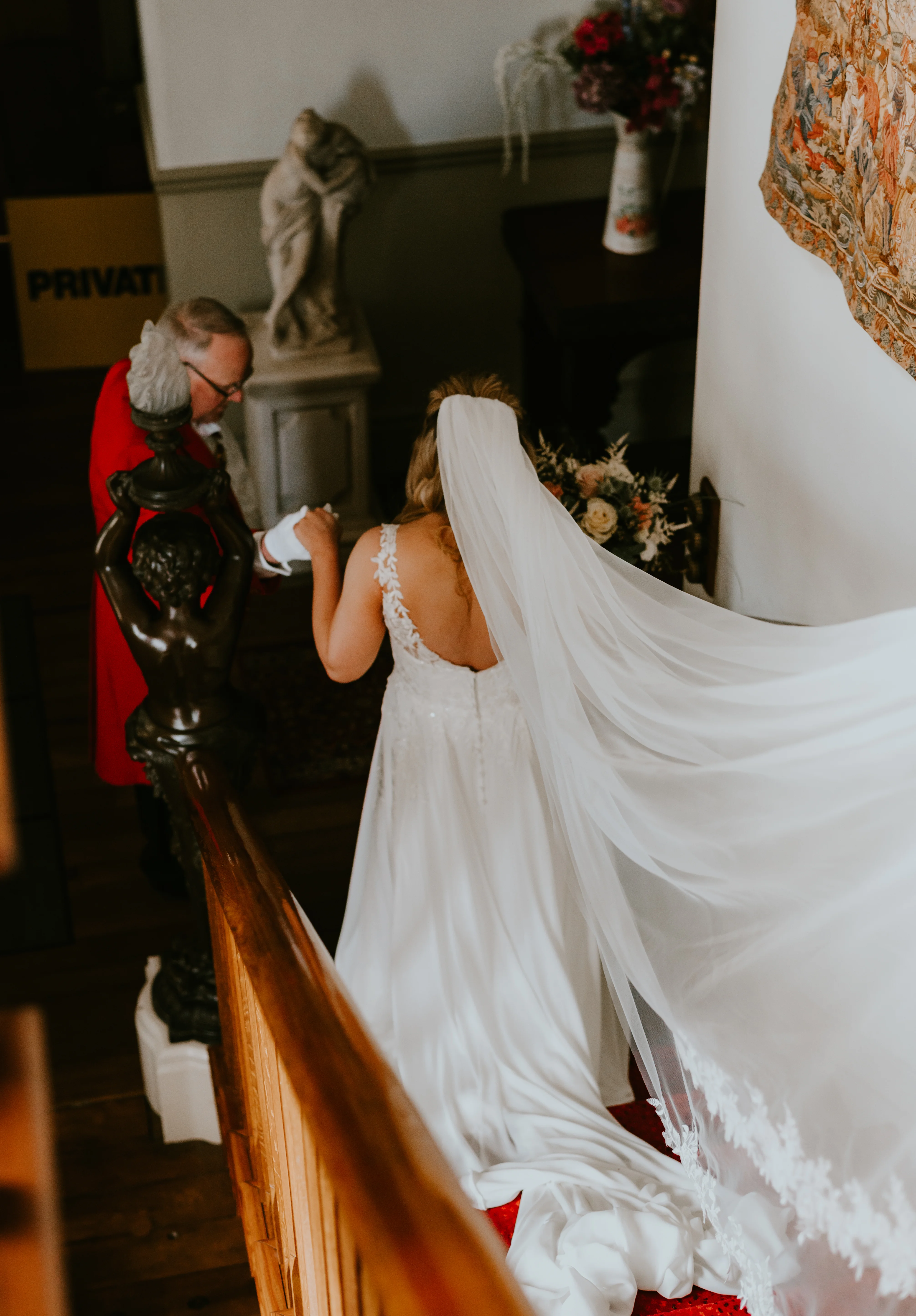 Bride walking down stairs