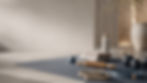Refined training studio setup with yoga mat, recovery roller, kettlebell, dumbbell, resistance bands, towel, and water bottle.